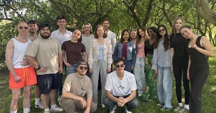 A photo of students at the picnic in the park.